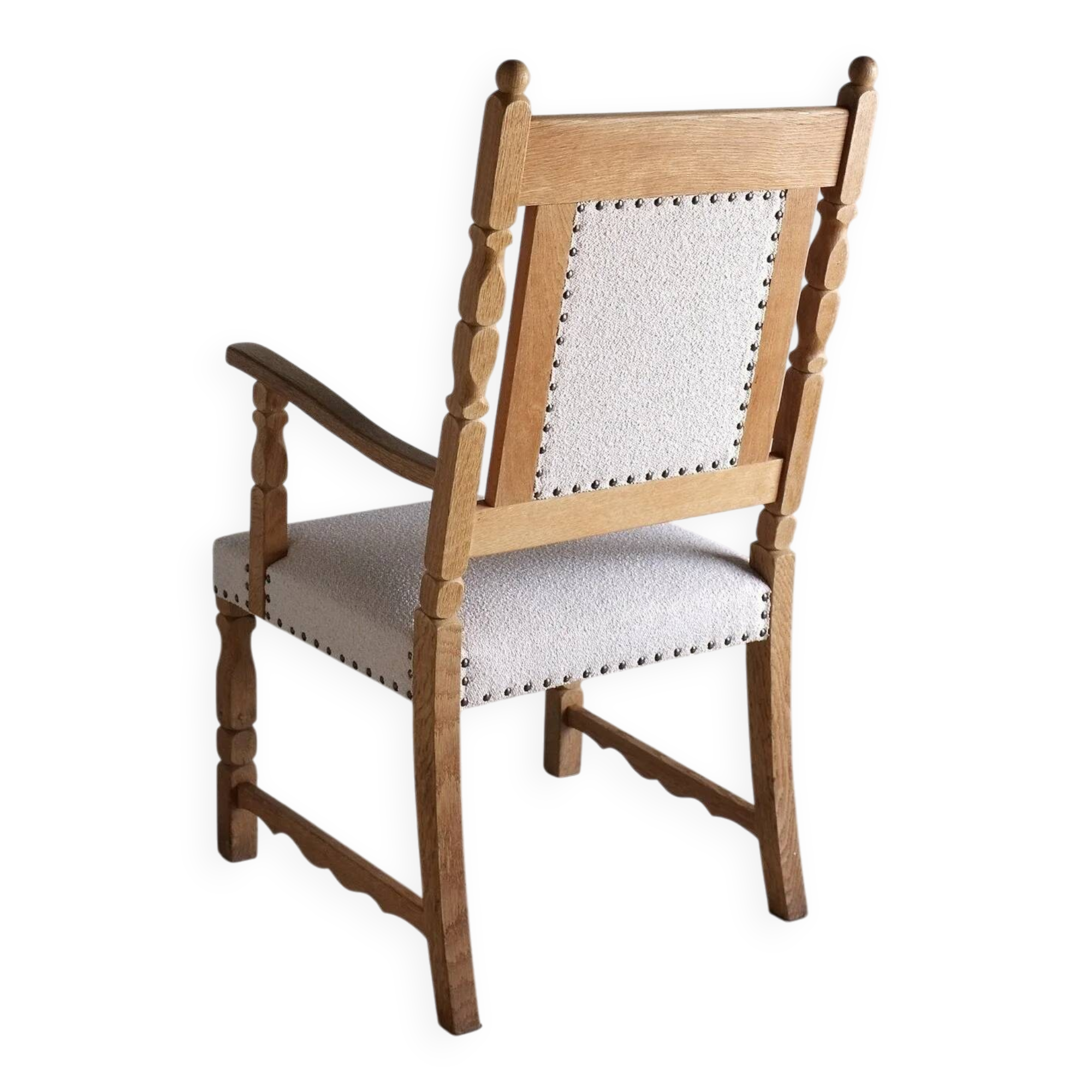 Carved oak armchair by Henning Kjaernulf | Denmark | 1960s