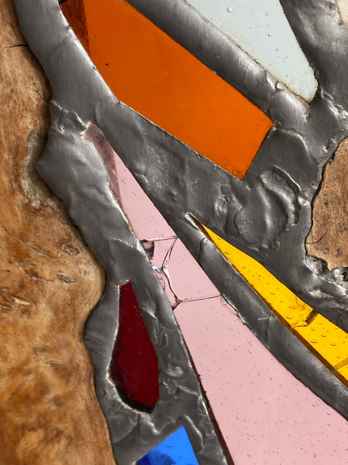 Carved wooden lamp and stained glass