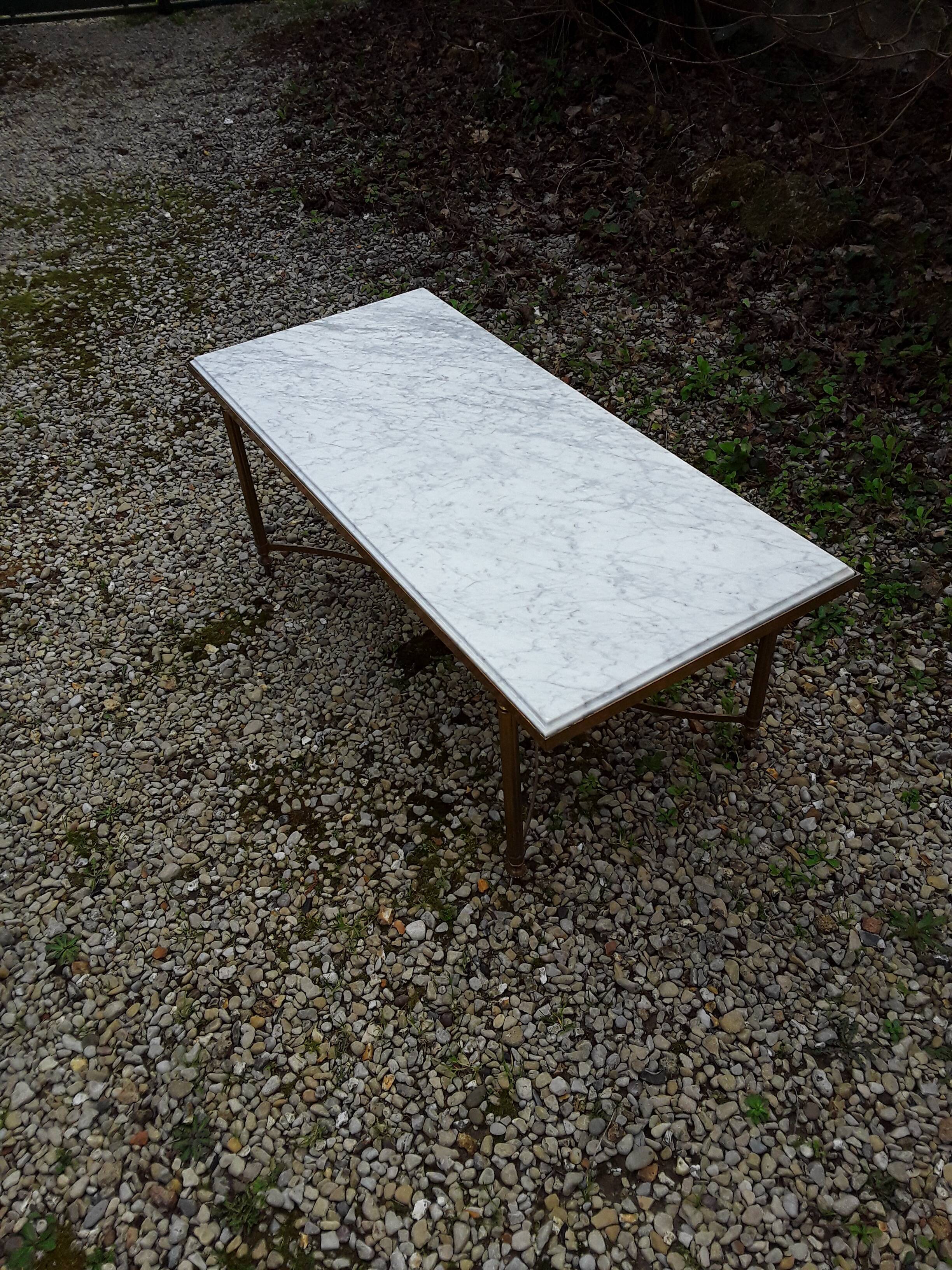 Marble coffee table and gilded brass