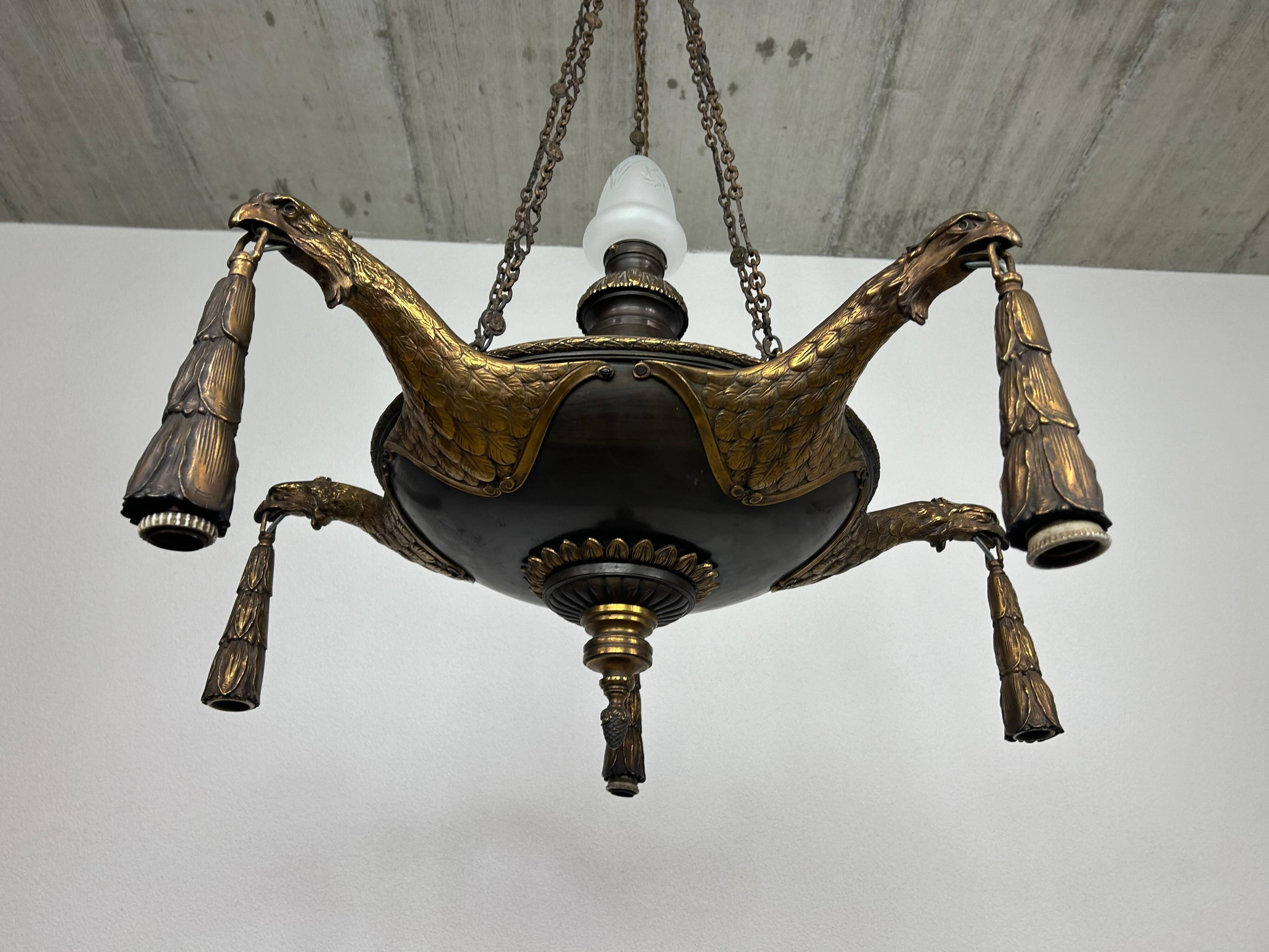 Extraordinary Art Deco chandelier with bronze eagles.