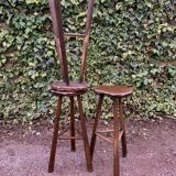 Set of three brutalist tripod stools