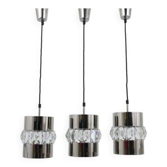 Three Bakalowits pendant lamps in nickel, brass, and faceted crystal, Austria, 1950s.