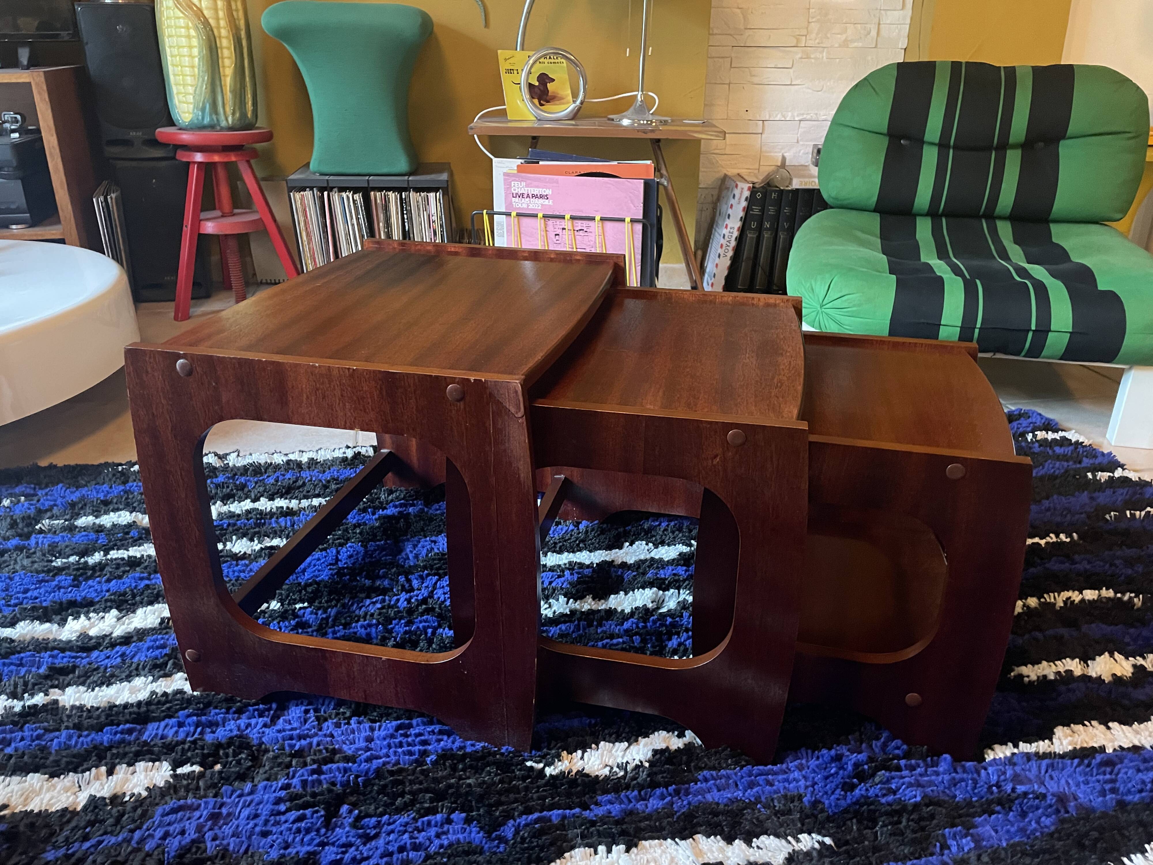Set of three nesting coffee tables, 1970, dark wood.