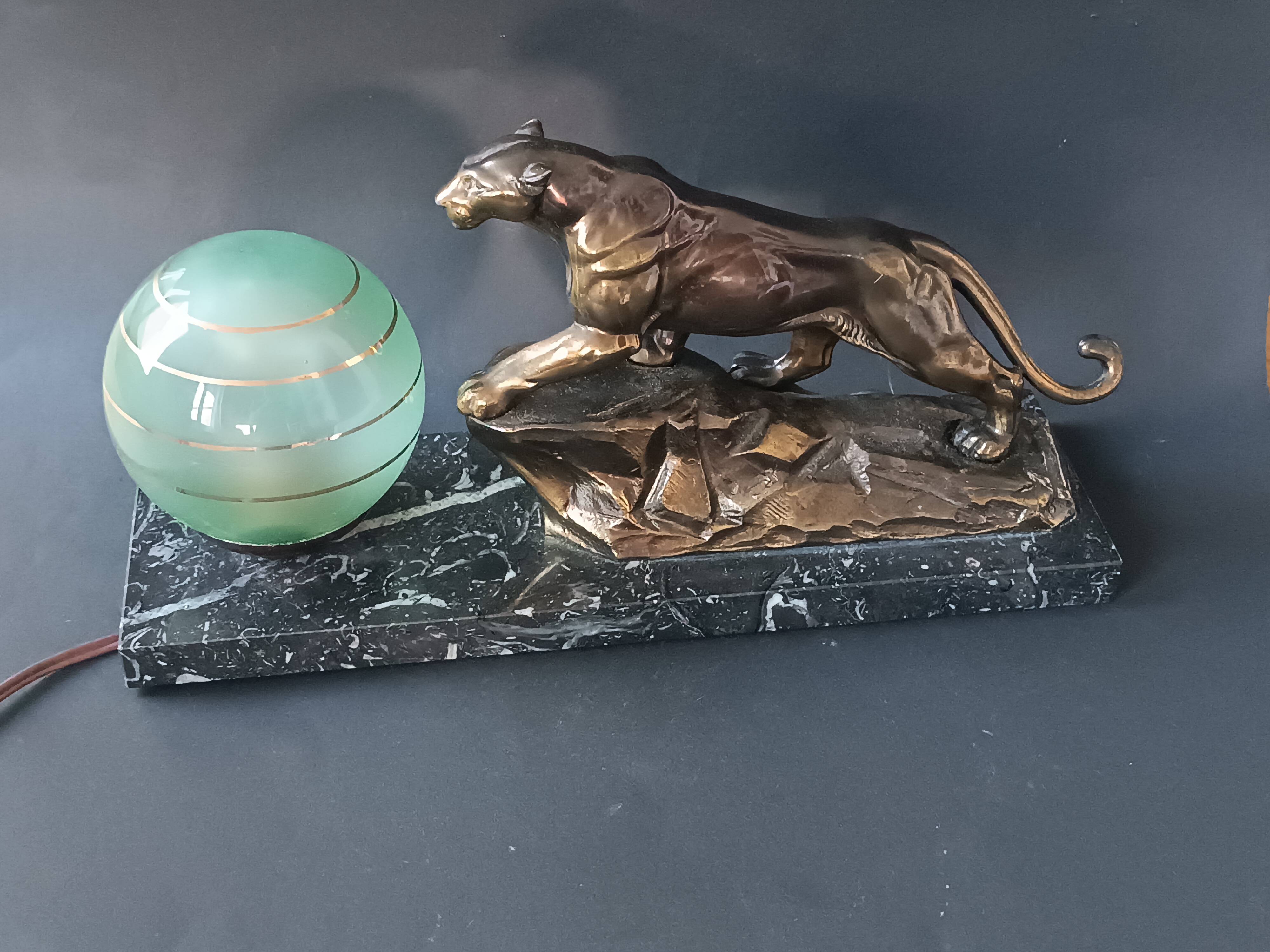 Panther desk lamp in spelter on a black and white marble base 1925