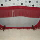 2-seater red velvet vintage sofa