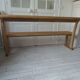 Church bench, bed end in pitch pine with light oak wax finish.