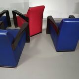 4 x Vintage Ying lounge chairs / fauteuils van Hugues Chevalier,'90. 3 x blue / 1 x red leather