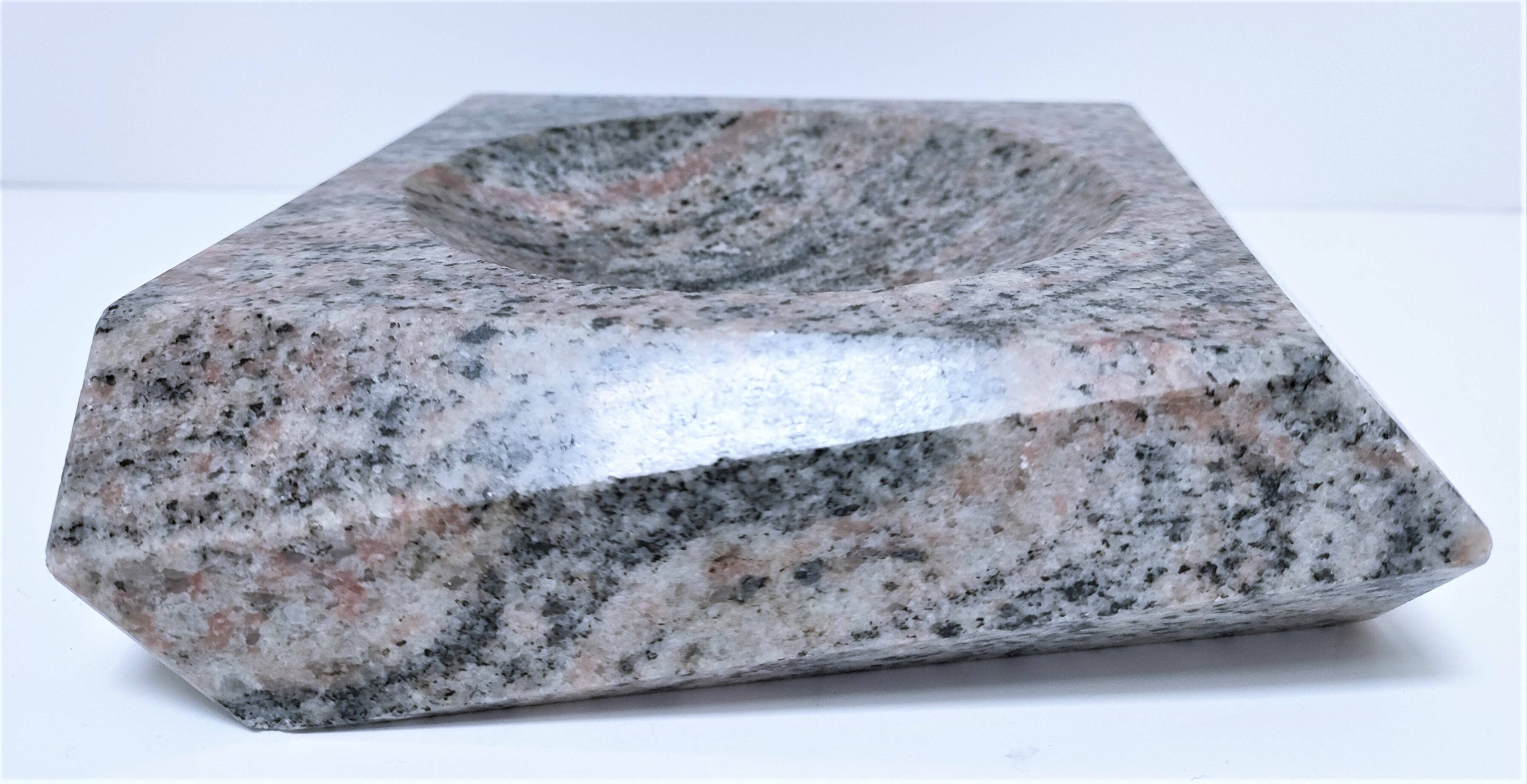 Pink granite pocket emptier from the 80s