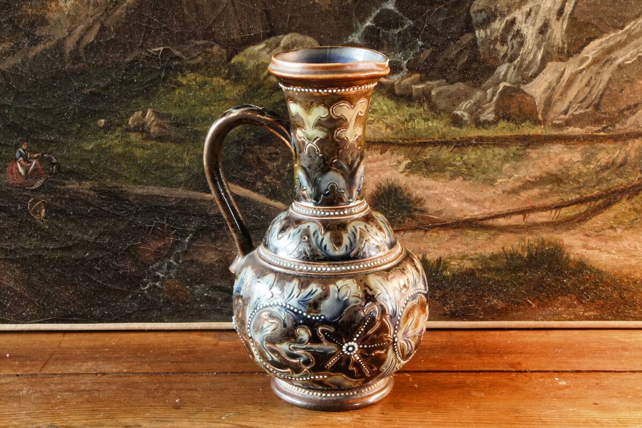 Doulton Lambeth stoneware jug (1879), floral decoration by Henry Winstanley.