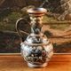 Doulton Lambeth stoneware jug (1879), floral decoration by Henry Winstanley.