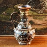Doulton Lambeth stoneware jug (1879), floral decoration by Henry Winstanley.