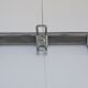 Vintage school wall rack in patinated steel