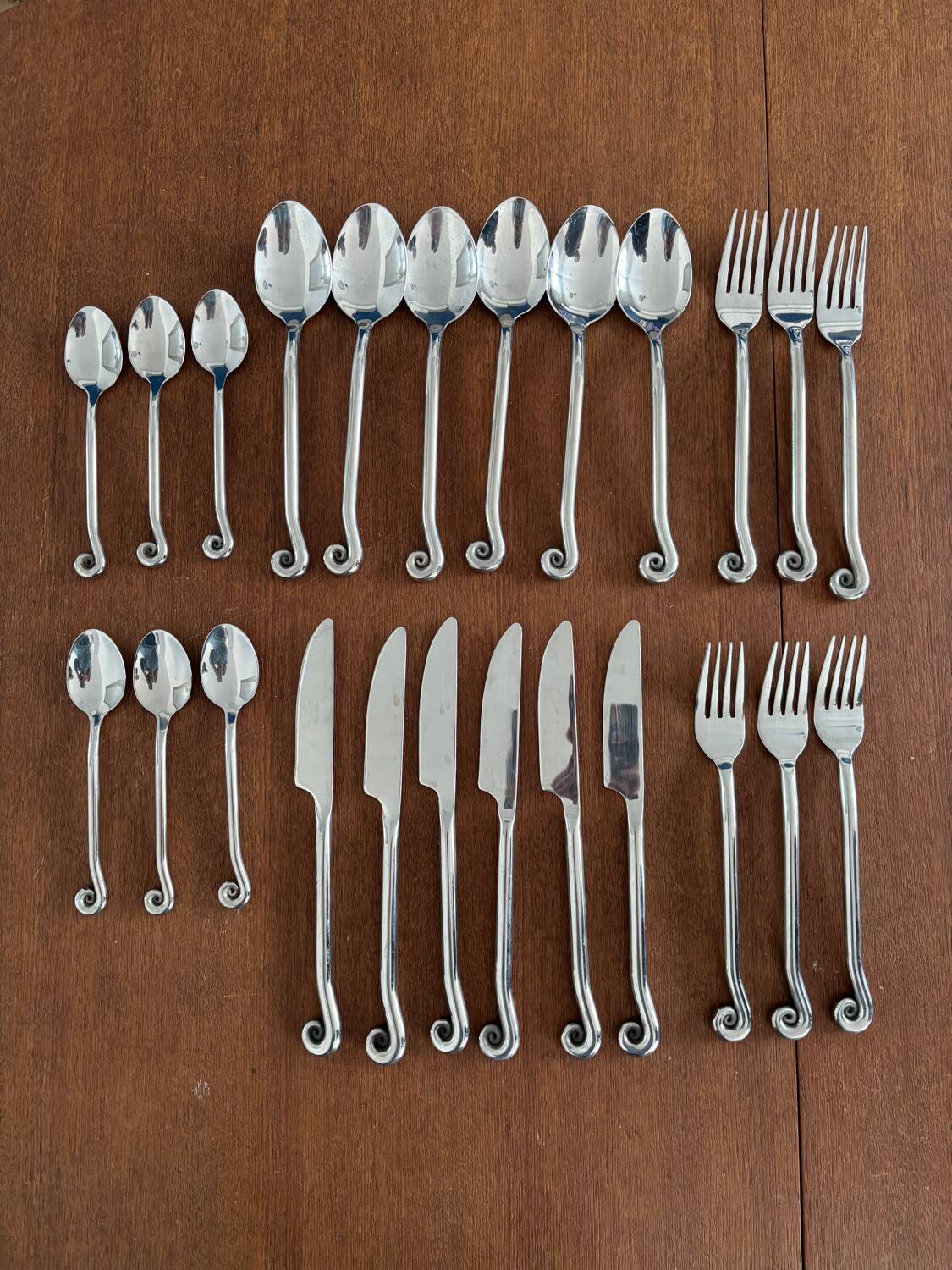 Vintage 24-piece stainless steel cutlery set with spiral handles