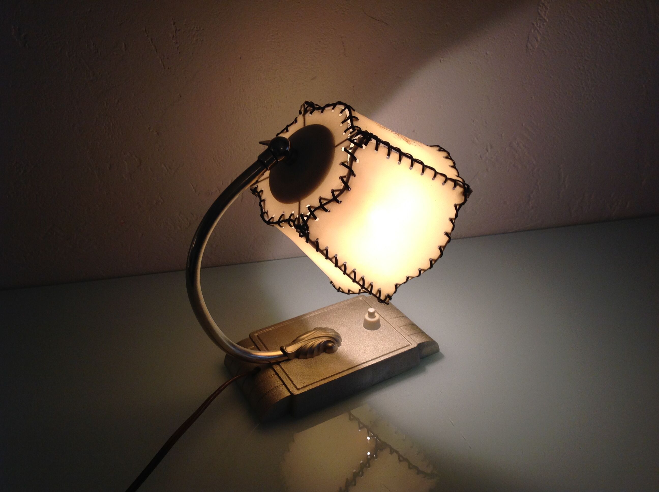 Brass bedside lamp and beige lampshade art deco style