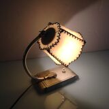 Brass bedside lamp and beige lampshade art deco style
