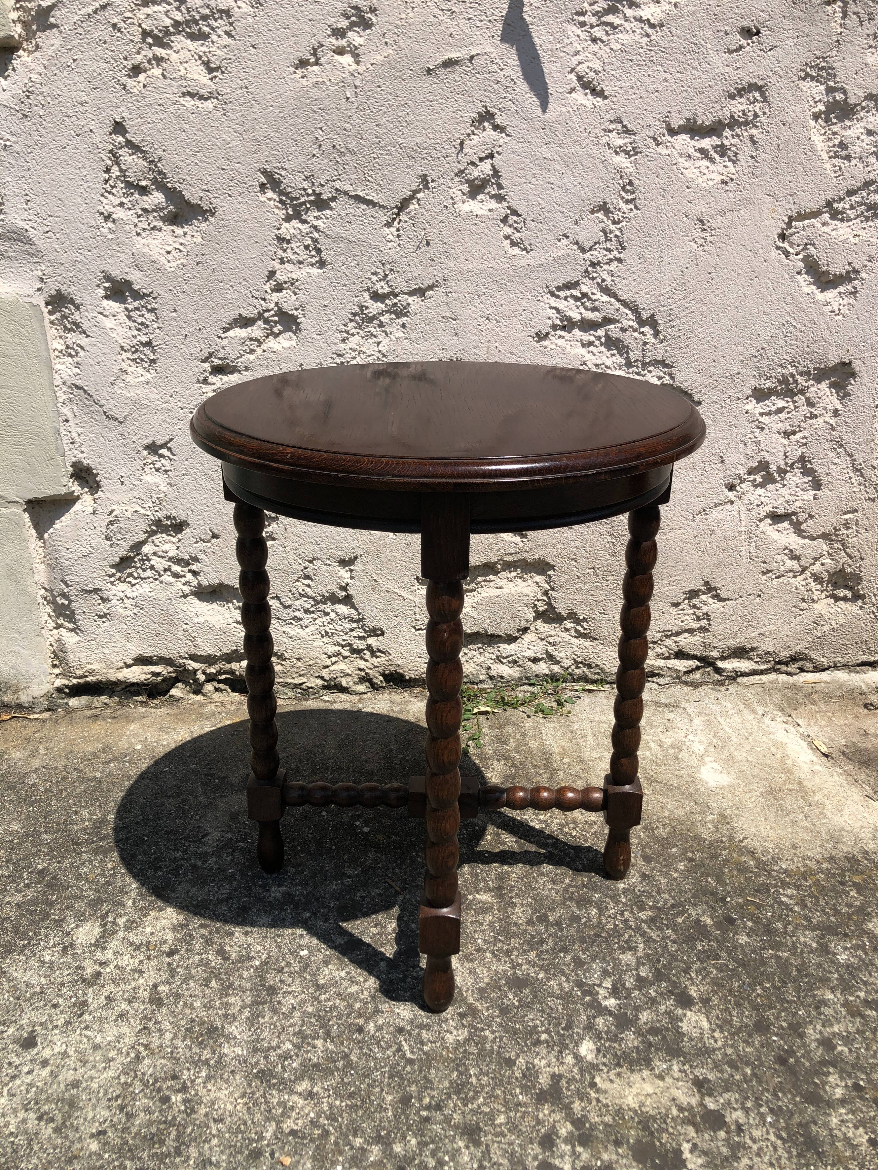 Dark turned wood side table