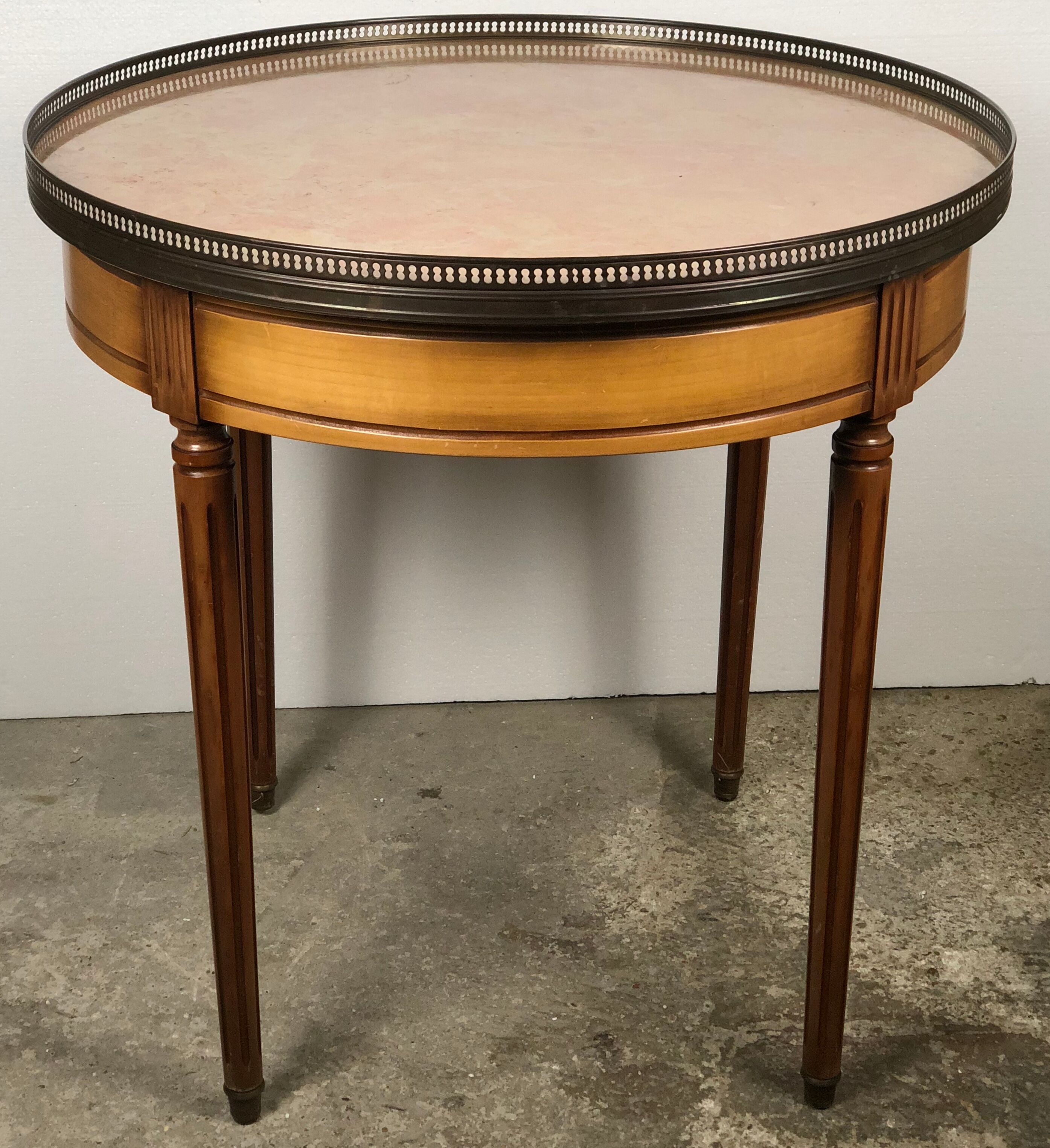 Louis XVI-style kettle table in cherry veneer with salmon marble top
