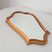 Vintage baroque mirror in gilded wood