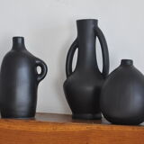 Trio of vintage black vases