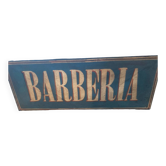 Barberia painted sheet metal sign
