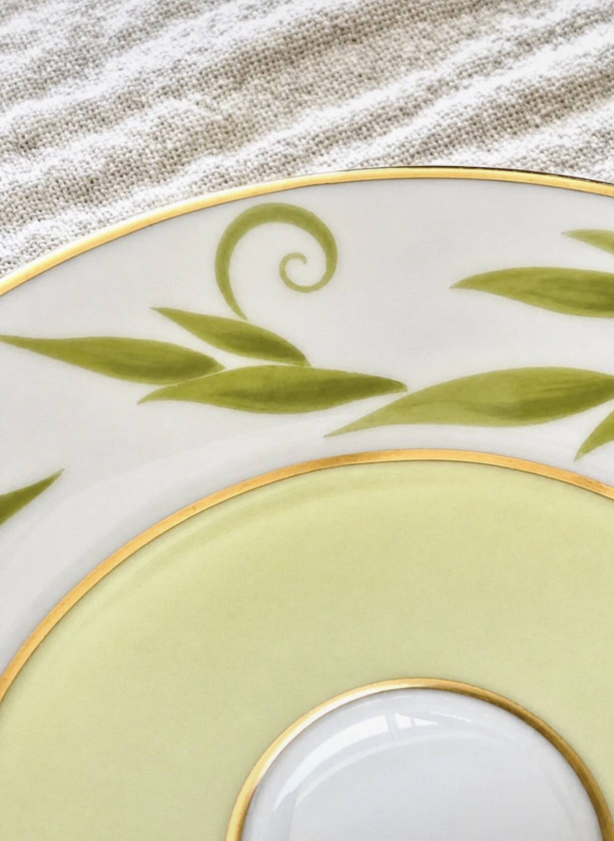 Bernardaud coffee/tea cup with saucer from the Frivole collection.