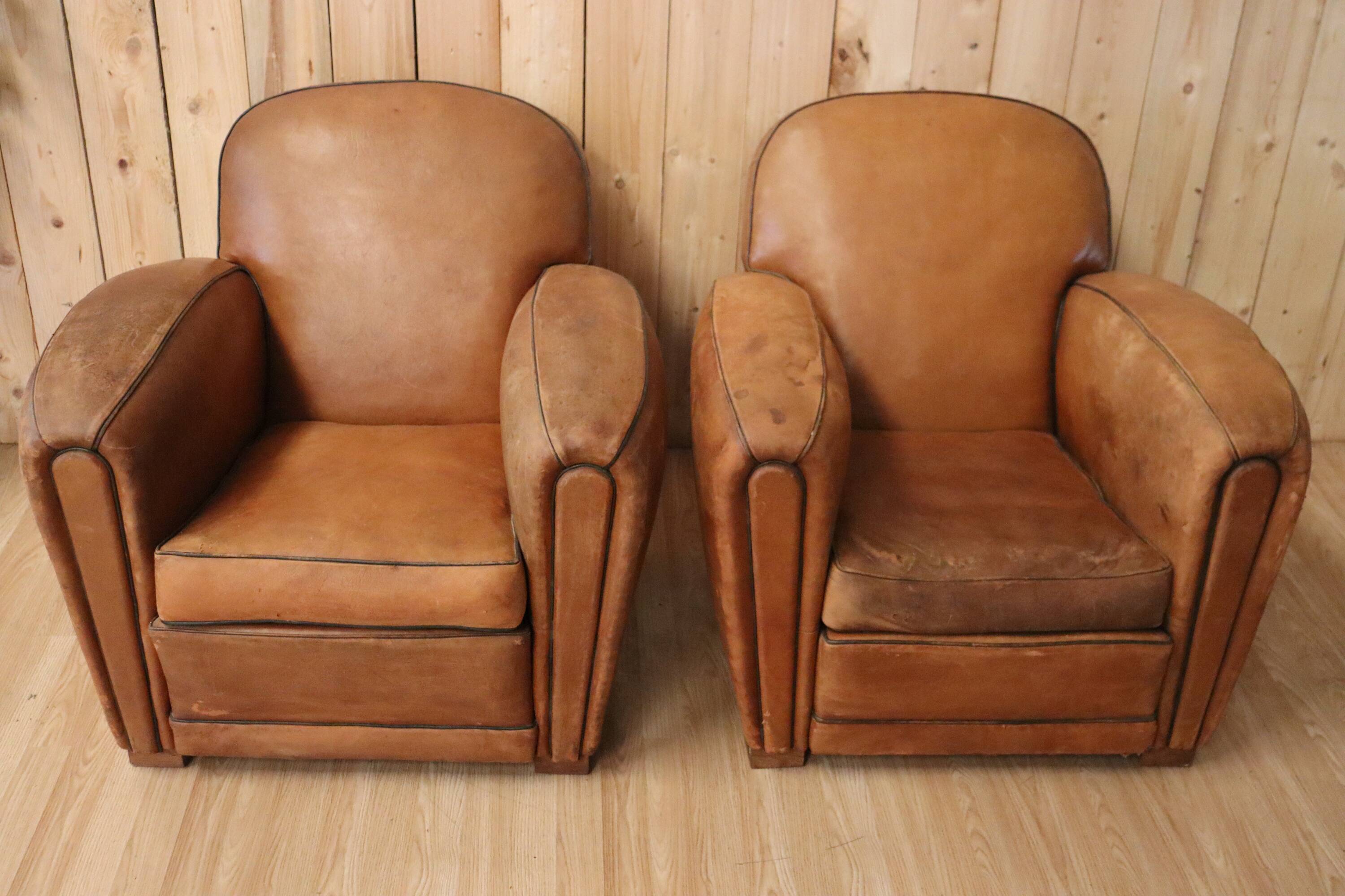Pair of Art Deco leather club armchairs from the 1930s.