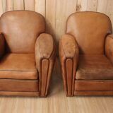 Pair of Art Deco leather club armchairs from the 1930s.