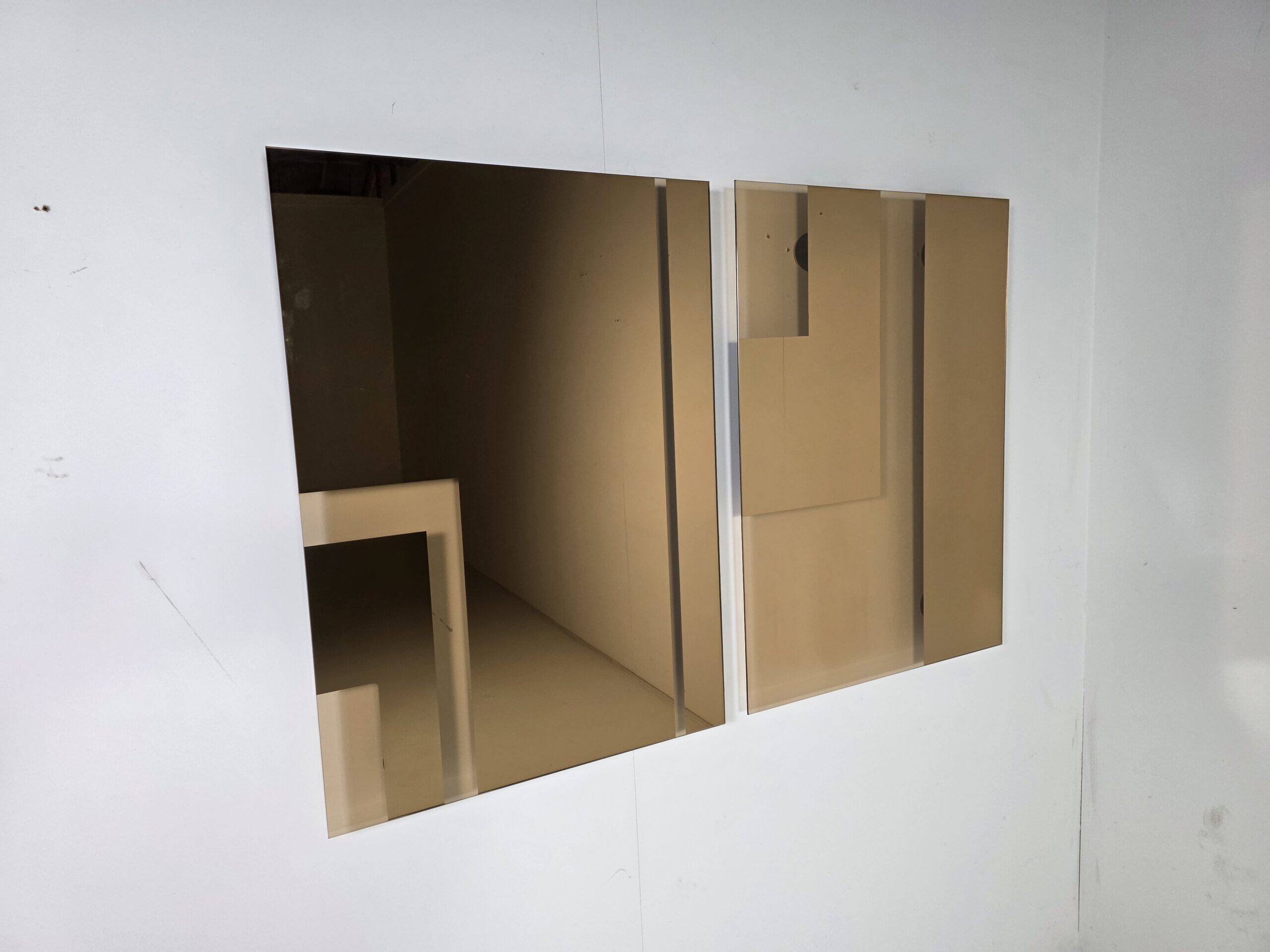 Pair of Andromeda mirrors by Nanda Vigo in 1974 for Glas Italia.