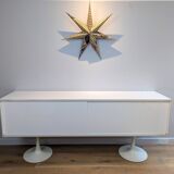 A vintage mid century space age sideboard with white sliding doors