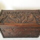 Coffre en bois sculpté bas reliefs artisanal XXème