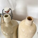 Set of 2 enamelled sandstone bottles