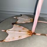 Old decorative pink flame in painted metal