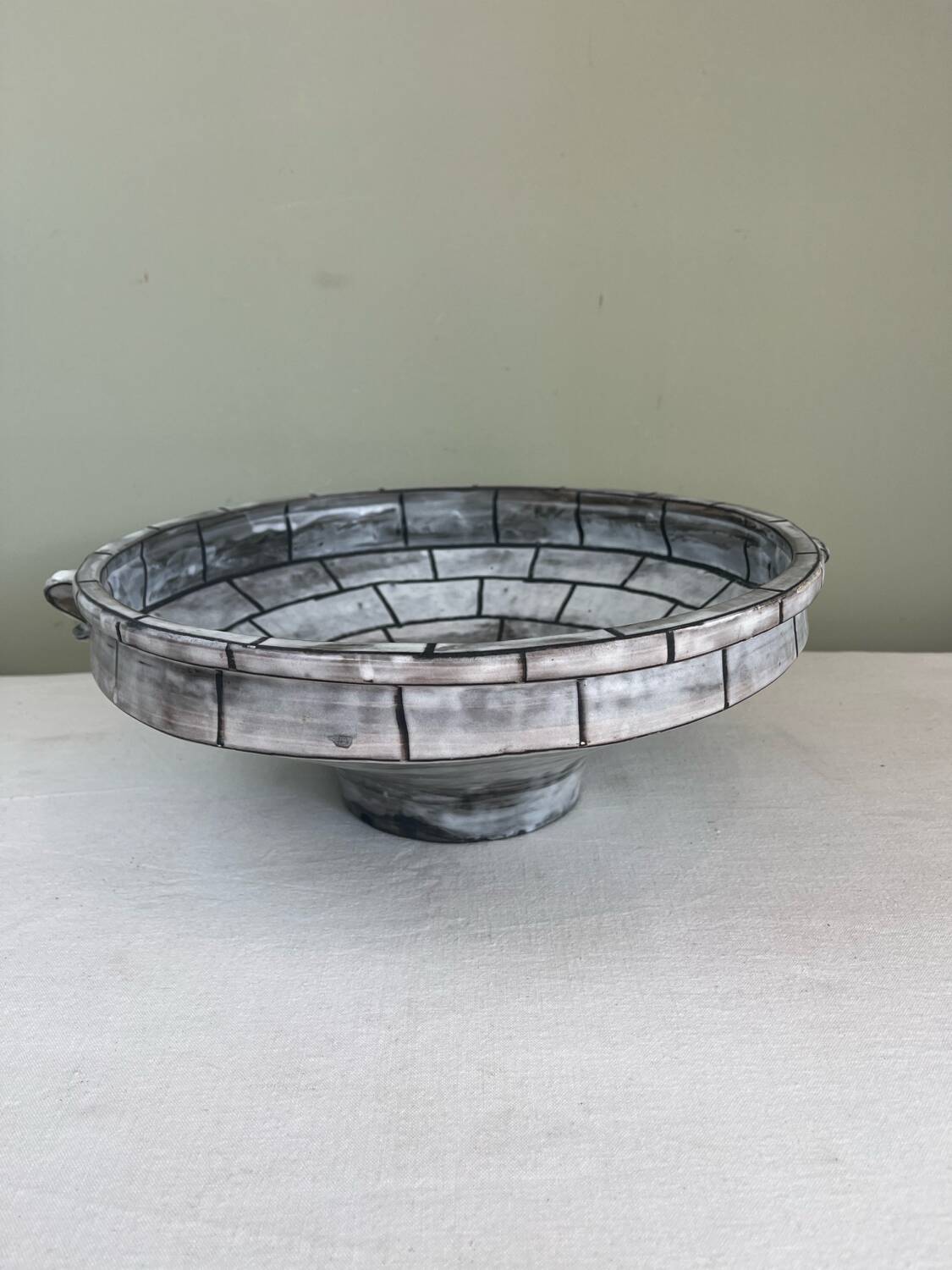 Handcrafted glazed ceramic architectural cup