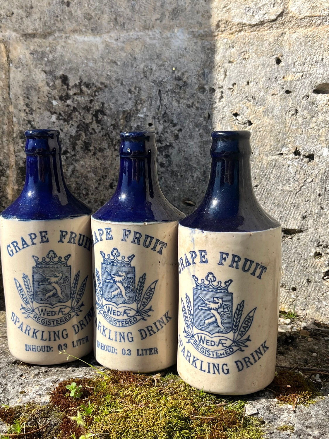 French stoneware grapefruit sparkling drink bottles