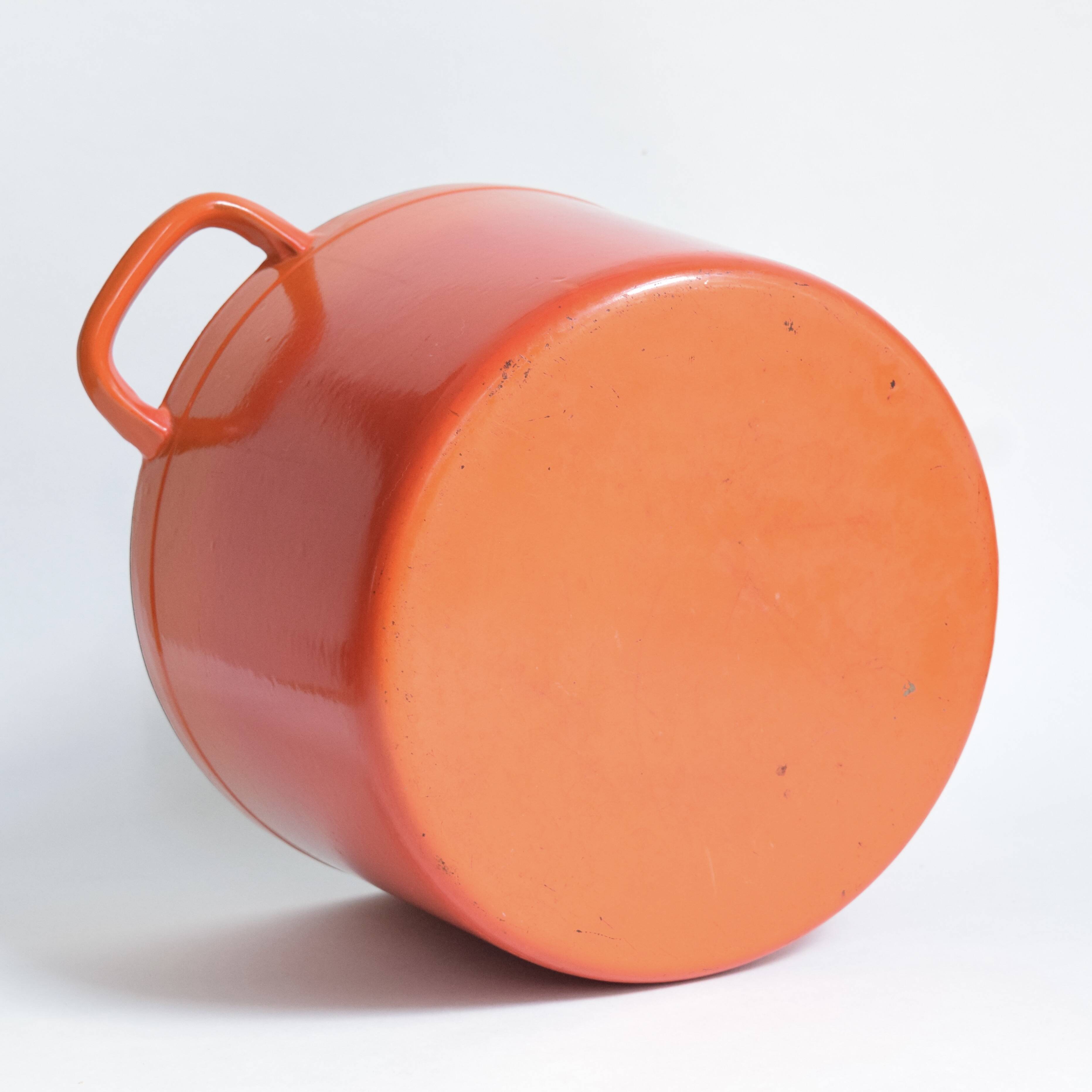 Large vintage saucepan or casserole dish in orange enameled cast iron
