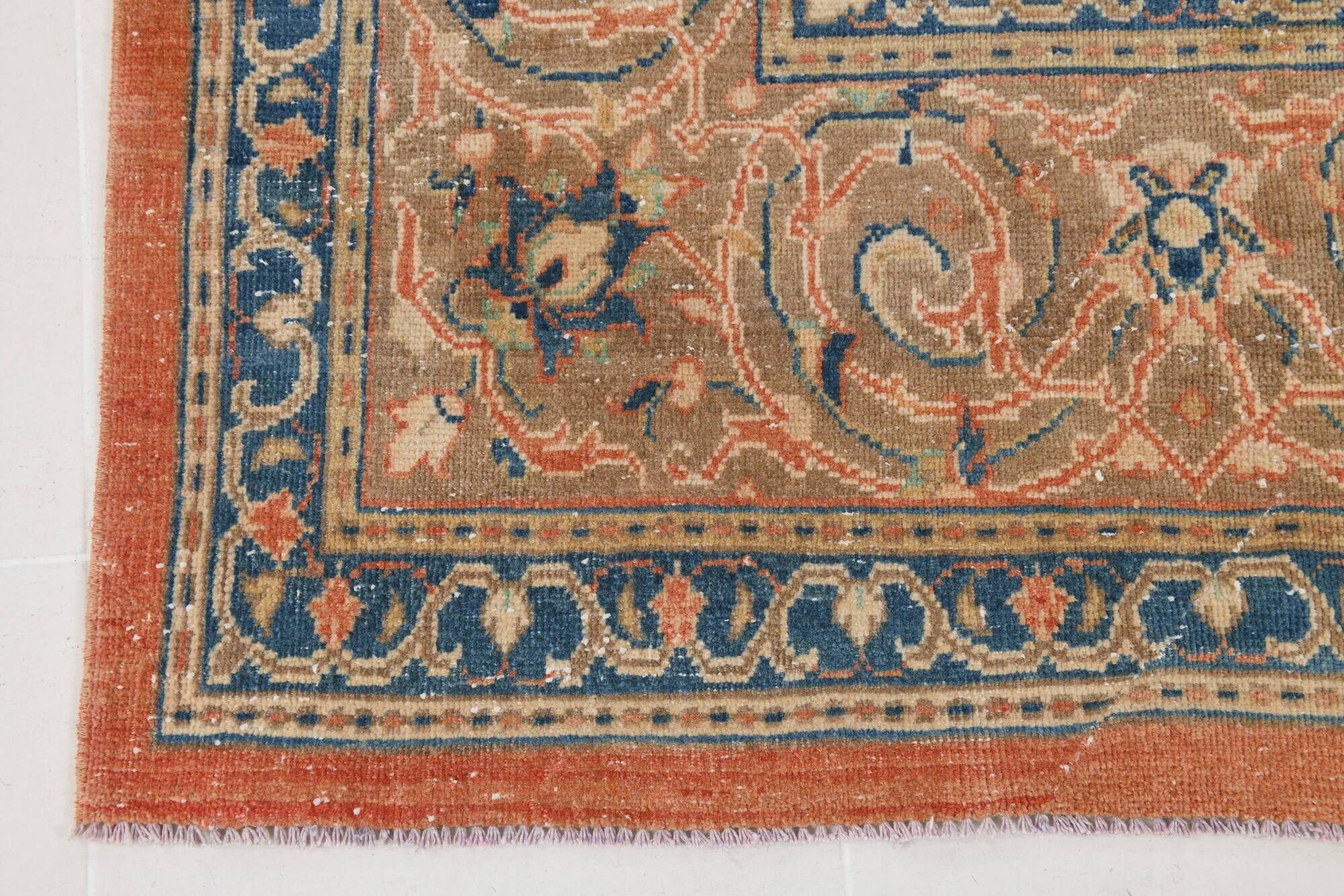 Vintage Turkish wool rug in terracotta beige with flowers, 10 × 13 feet.