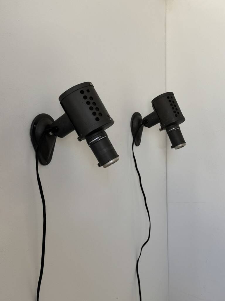 Pair of vintage matte black metal wall lights, France, 1970, LITA