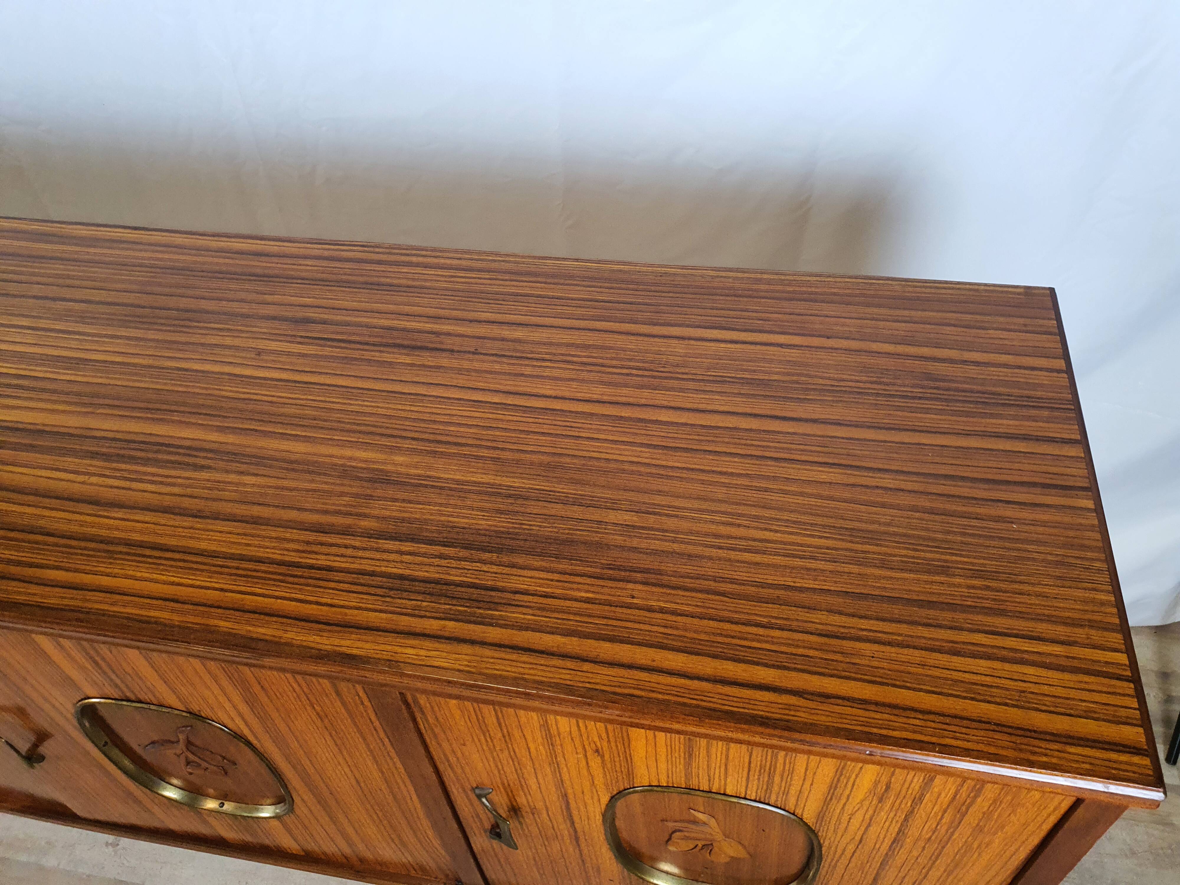 1960s sideboard with decorated doors in wood and brass