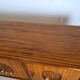 1960s sideboard with decorated doors in wood and brass