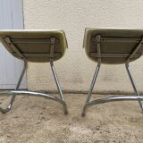 Pair of 70's smoked plexiglass and chrome chairs