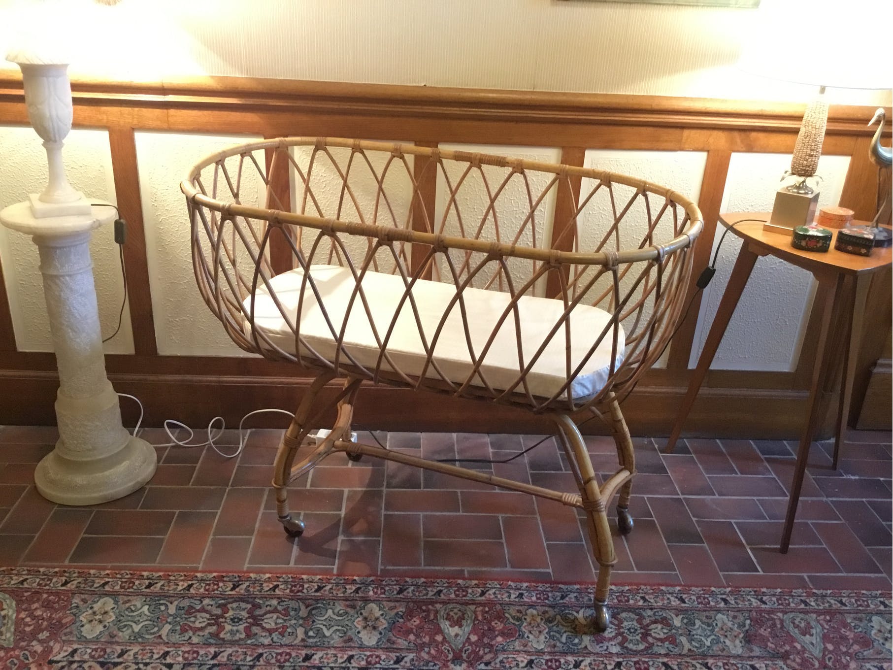 Vintage rattan cradle