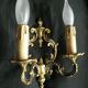 Pair of bronze double-arm appliques