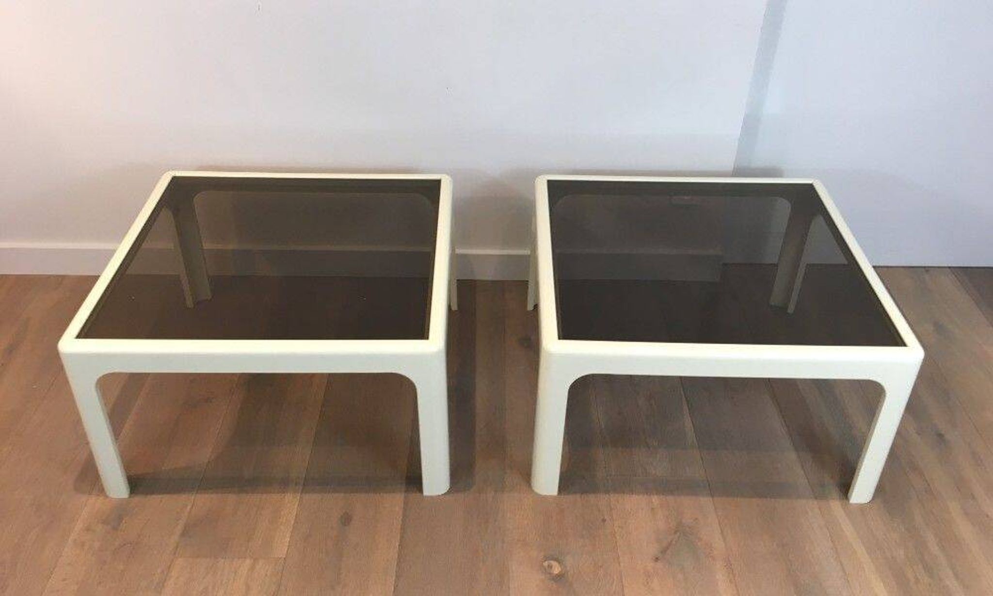 Pair of large white lacquered fiberglass side tables. Poschinger