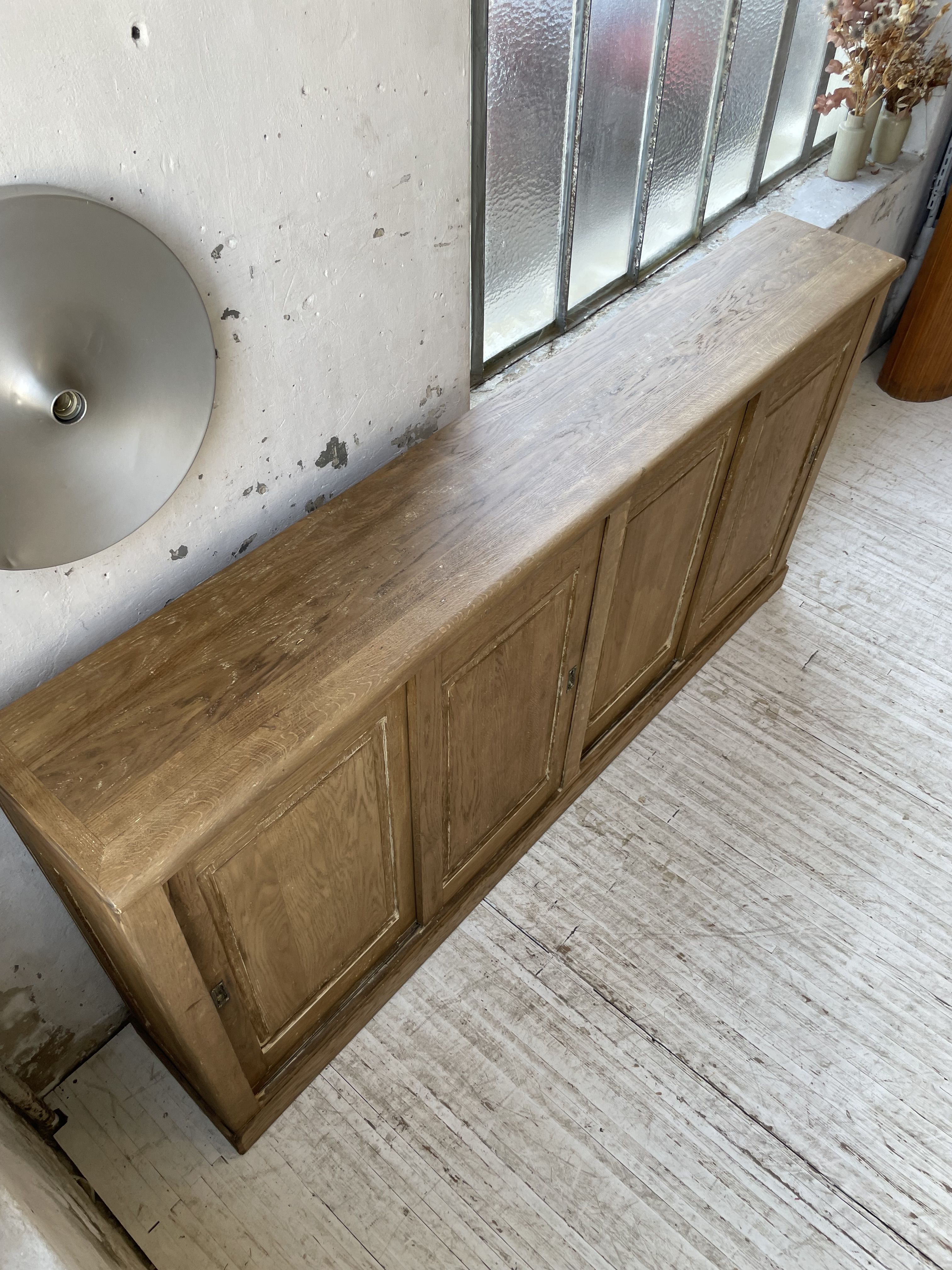 Large row of solid oak loom sliding doors