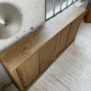 Large row of solid oak loom sliding doors