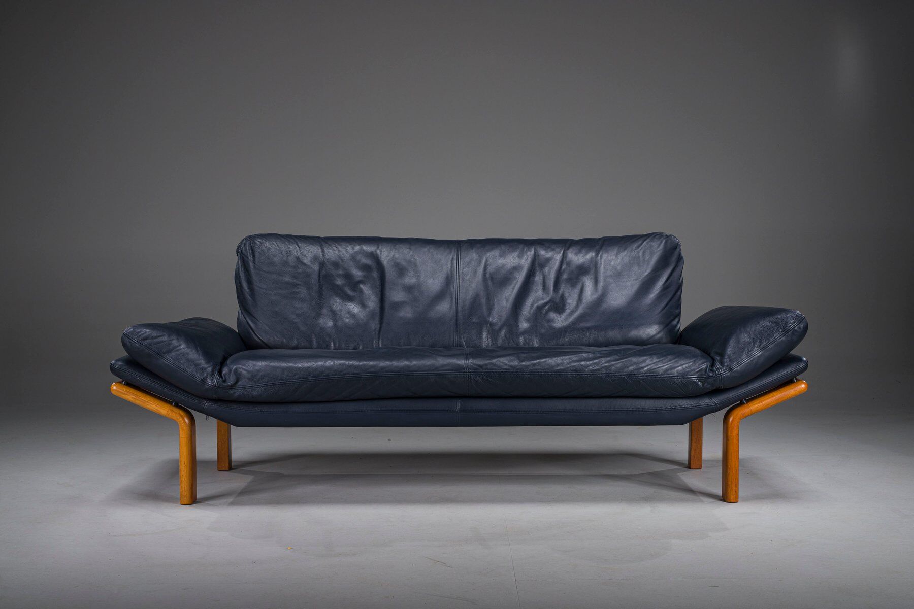 Danish teak and navy blue leather 3-seater sofa from Komfort, 1970s
