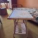 Vintage bedside table in bamboo and rattan with decorative top.