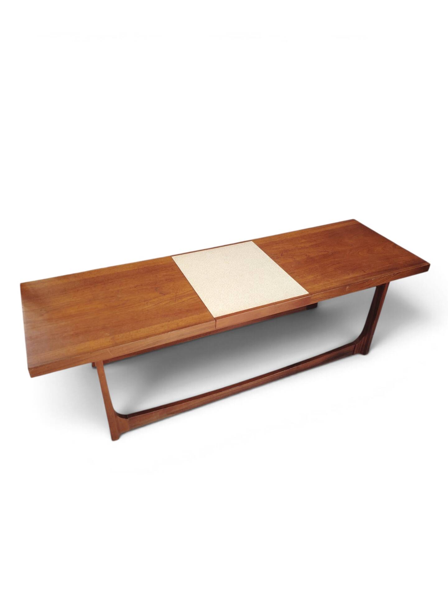 Vintage Scandinavian extendable coffee table with sled legs.