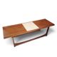 Vintage Scandinavian extendable coffee table with sled legs.
