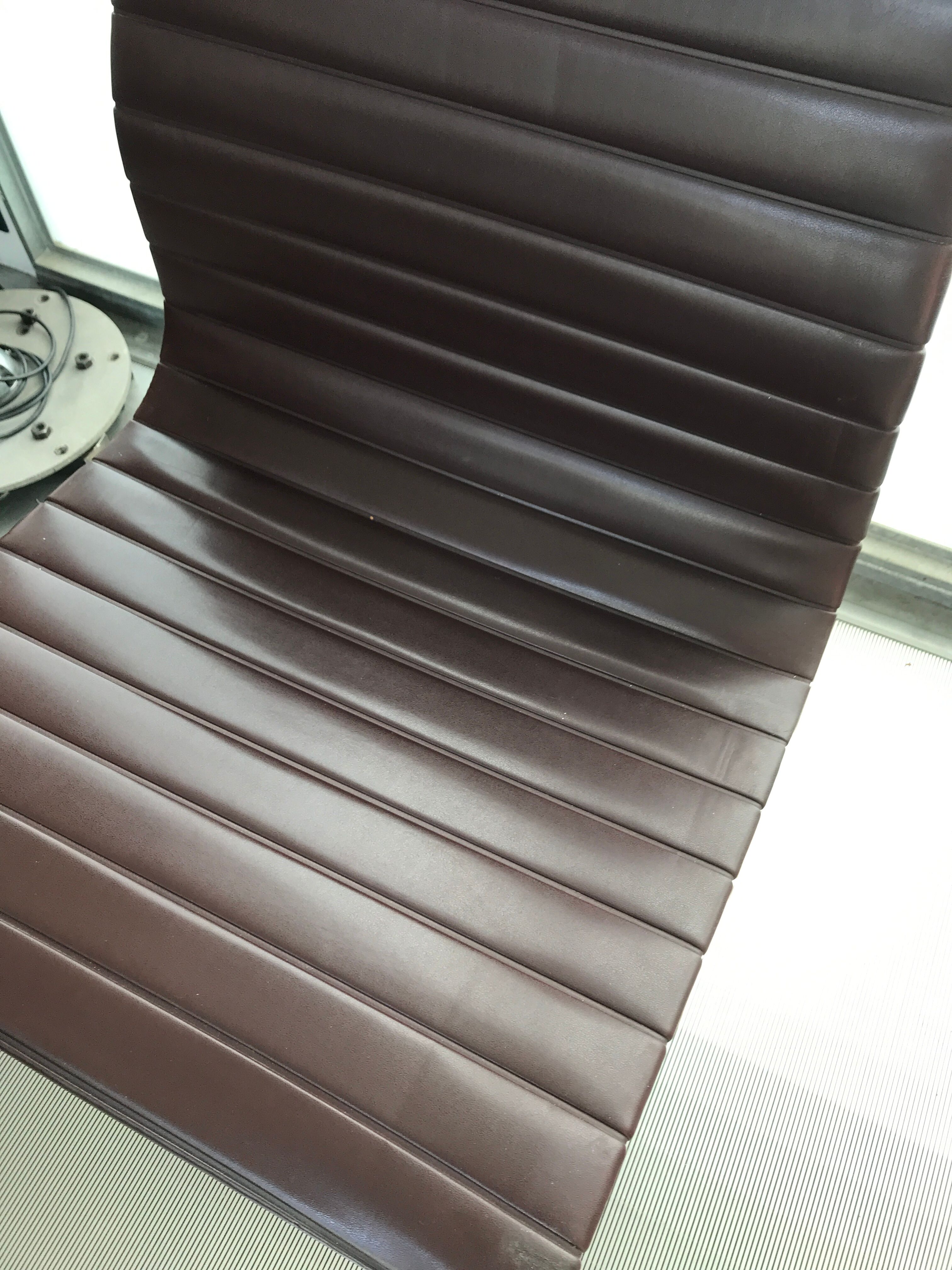 EA107 armchair by Charles and Ray Eames for Vitra